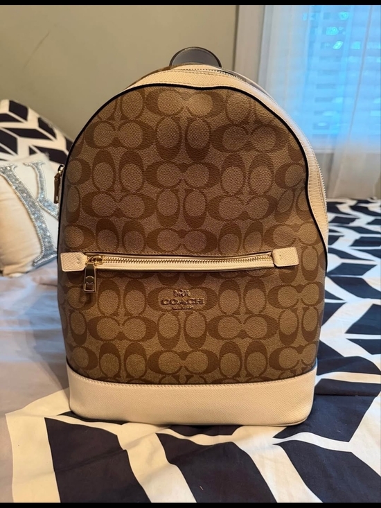 coach court backpack In Signature Canvas Signature coated canvas printed coated canvas and refined pebble leather Inside zip and multifunction pockets Double zip closure fabric lining Handle with 2 1/4 drop Outside zip pocket Adjustable shoulder straps 10 3/4 (L) x 12 1/2 (H) x 4 3/4 (W) Style No. Coach Court Backpack Review |